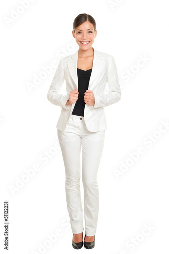 Photo: Business woman young professional standing in suit Business woman young professional standing in suit