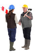 craftsman and craftswoman shaking hands