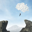 businessman flying on balloons