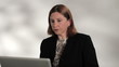 A professional woman giving a presentation.