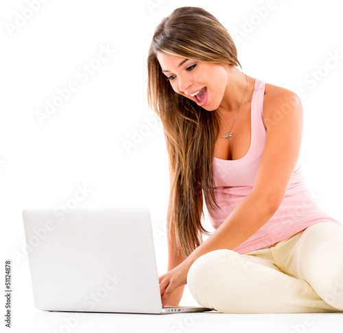 Photo: Woman using a laptop Woman using a laptop