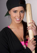 Pretty Female Baseball Lover Holds A Wooden Bat and Smiles