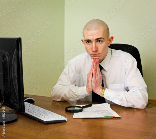 Photo: Thoughtful puzzle office manager Thoughtful puzzle office manager
