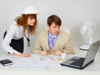 Business construction industry team looking on laptop