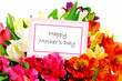 Photo: Happy Mothers Day tag among a bouquet of flowers Happy Mothers Day tag among a bouquet of flowers