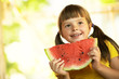 girl with a piece of watermelon