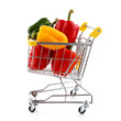 Shopping trolley full of pepper on white background