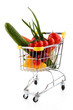 Shopping trolley full of vegetables on white background