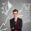 man in front of charts