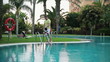 Video: Family by the hotel swimming pool, steadicam shot Family by the hotel swimming pool, steadicam shot