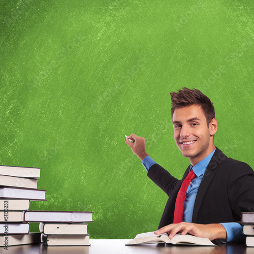 Photo: man prepares to write man prepares to write