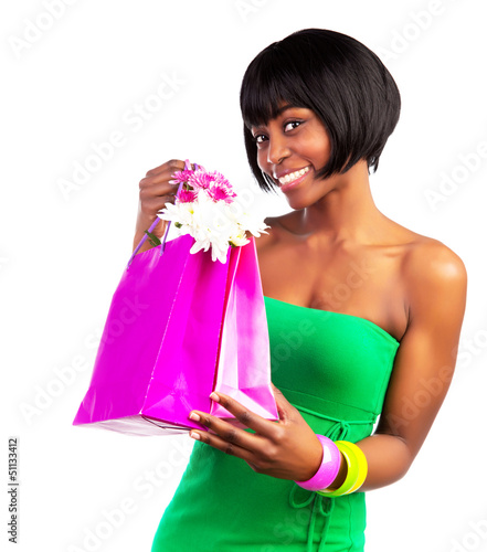Photo: Black woman with shopping bag Black woman with shopping bag
