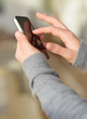 Close-up Of Hand Holding Cellphone