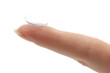contact lens on finger isolated on white
