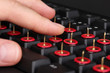 Painful typing on keyboard close-up