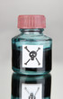 Deadly poison in bottle on grey background