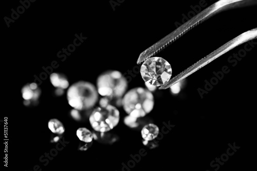 Photo: Beautiful shining crystal (diamond) in the tweezers, Beautiful shining crystal (diamond) in the tweezers,
