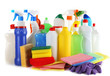 Different kinds of house cleaners and colorful sponges, gloves