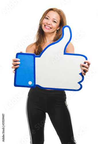 Photo: Mid-adult Woman Holding Like Sign Mid-adult Woman Holding Like Sign
