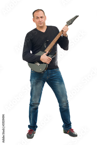 Photo: Portrait Of Mature Man Playing Guitar Portrait Of Mature Man Playing Guitar