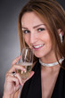 Portrait Of Young Beautiful Woman Drinking Champagne