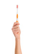 Human Hand Holding Toothbrush