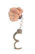 Close-up Hand Holding Handcuffs