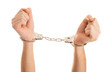 Close-up Hand Holding Handcuffs