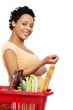 Pregnant woman with shopping basket