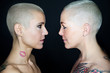 beautiful women with short hair looking eachother