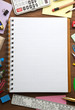 school supplies and checked notebook
