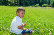 baby sat on the lawn