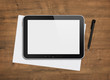 Photo: Blank digital tablet on a desk Blank digital tablet on a desk