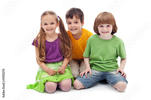 Photo: Happy kids sitting on the floor Happy kids sitting on the floor