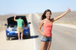 Foto : Car breakdown problems - woman hitchhiking Car breakdown problems - woman hitchhiking