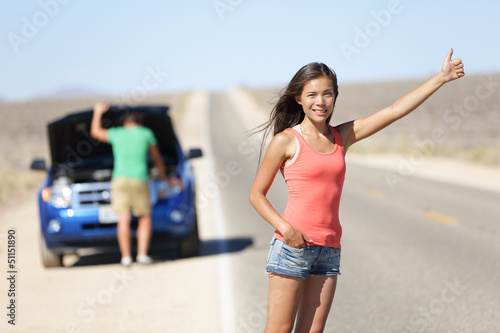 Photo: Car breakdown problems - woman hitchhiking Car breakdown problems - woman hitchhiking