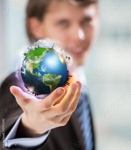 Photo: The World is in Your Hand. Conceptual Image The World is in Your Hand. Conceptual Image