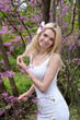 Woman in white dress outdoor in park