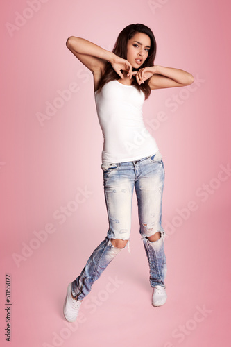 Photo: hip hop dancer posing standing sideways to the camera hip hop dancer posing standing sideways to the camera