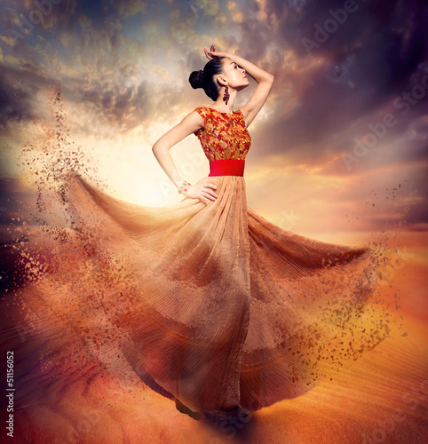 Photo: Dancing Fashion Woman wearing Blowing Long Chiffon Dress Dancing Fashion Woman wearing Blowing Long Chiffon Dress