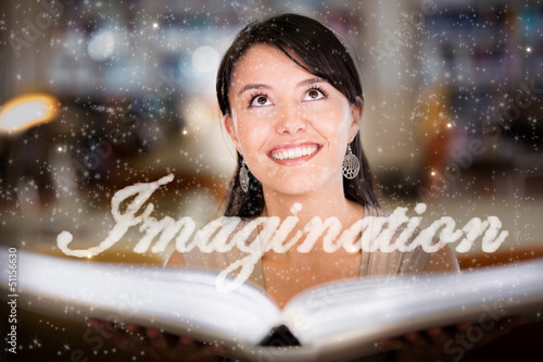Photo: Woman letting her imagination fly Woman letting her imagination fly
