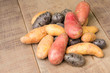 Colorful potatoes on table