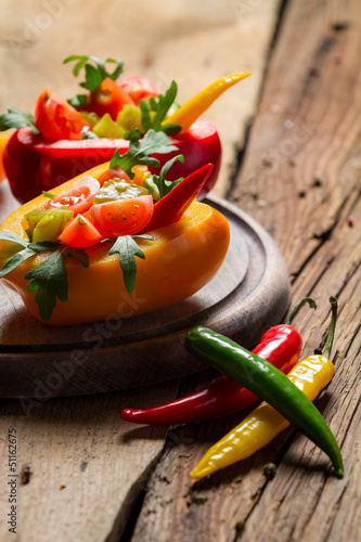 Photo: Salad made from fresh vegetables and served in bell pepper Salad made from fresh vegetables and served in bell pepper