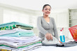 woman ironing clothes