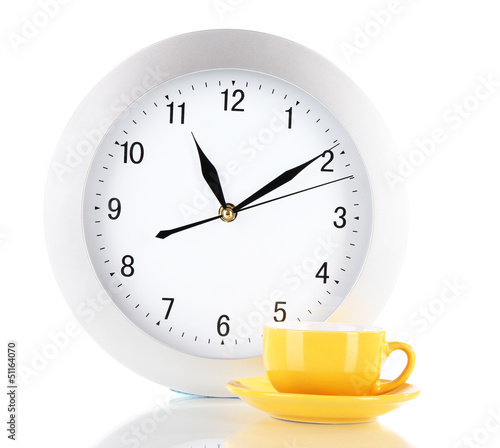Photo: Cup coffee and clock isolated on white Cup coffee and clock isolated on white