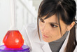 female chemist with flask