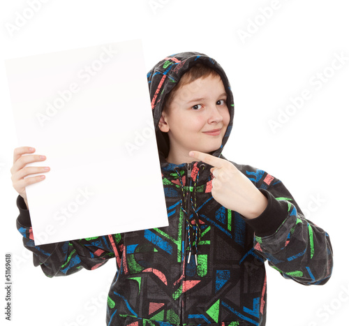 Photo: teenager standing by white blank card teenager standing by white blank card