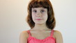 child making faces and posing