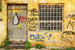 Photo: Abandoned shop exterior covered with graffiti in Athens Abandoned shop exterior covered with graffiti in Athens