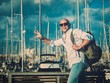 Happy middle-aged man with backpack 